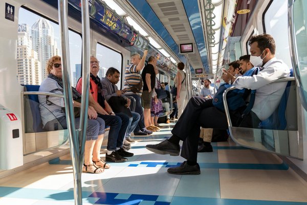 How can inclusive design principles be applied to enhance public transportation accessibility?